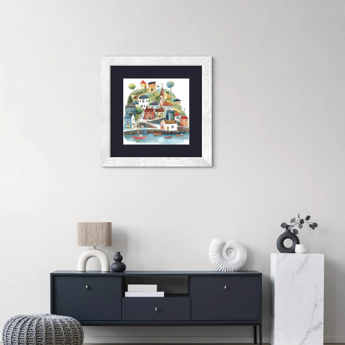 Colourful illustration of a coastal village with houses on hills and boats on water.