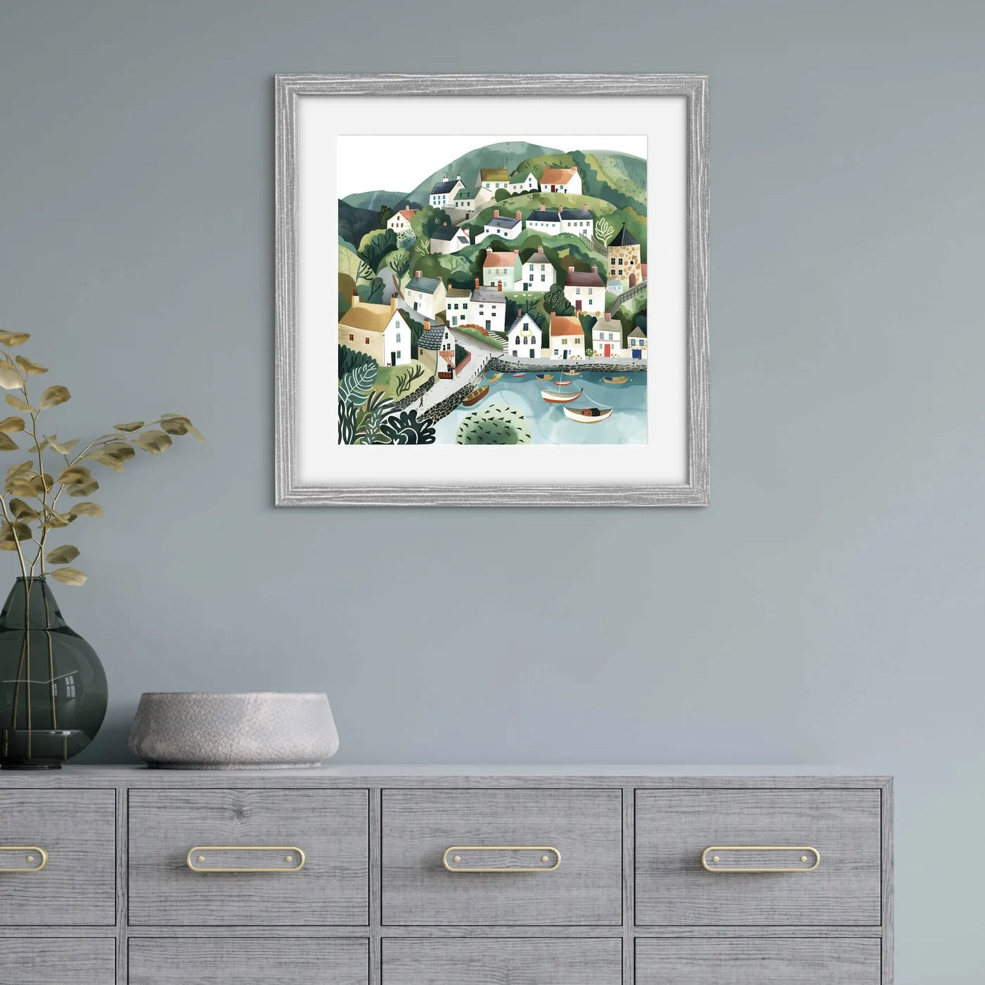 Art print depicting a charming coastal village with houses, hills, and boats in a harbour.
