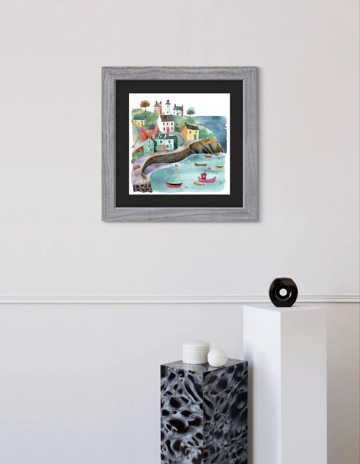 Illustration of a vibrant coastal village with colourful houses and boats.