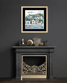 Art print of a coastal village with cottages and boats in a harbour, in earthy and blue tones.