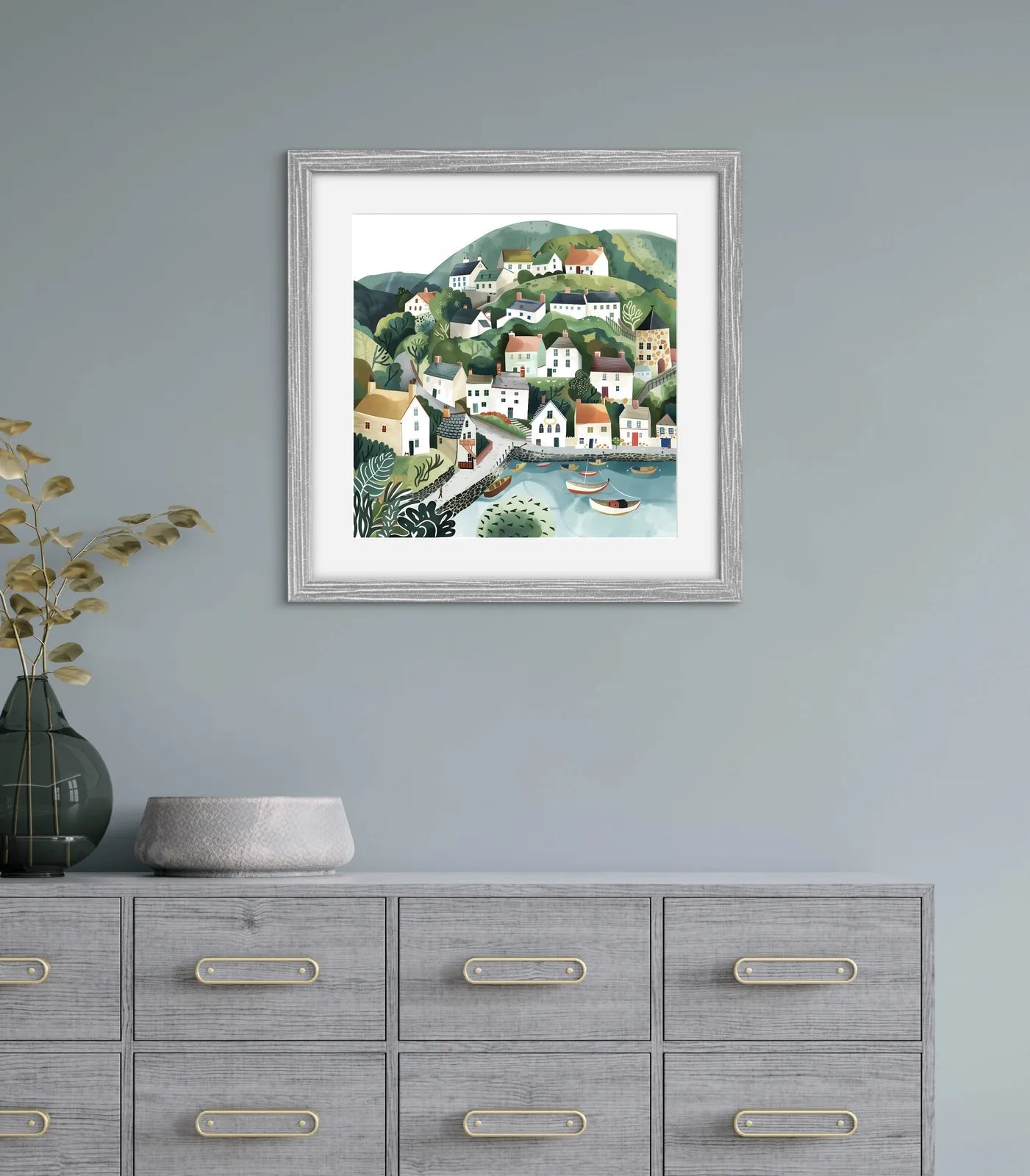 Art print depicting a charming coastal village with houses, hills, and boats in a harbour.