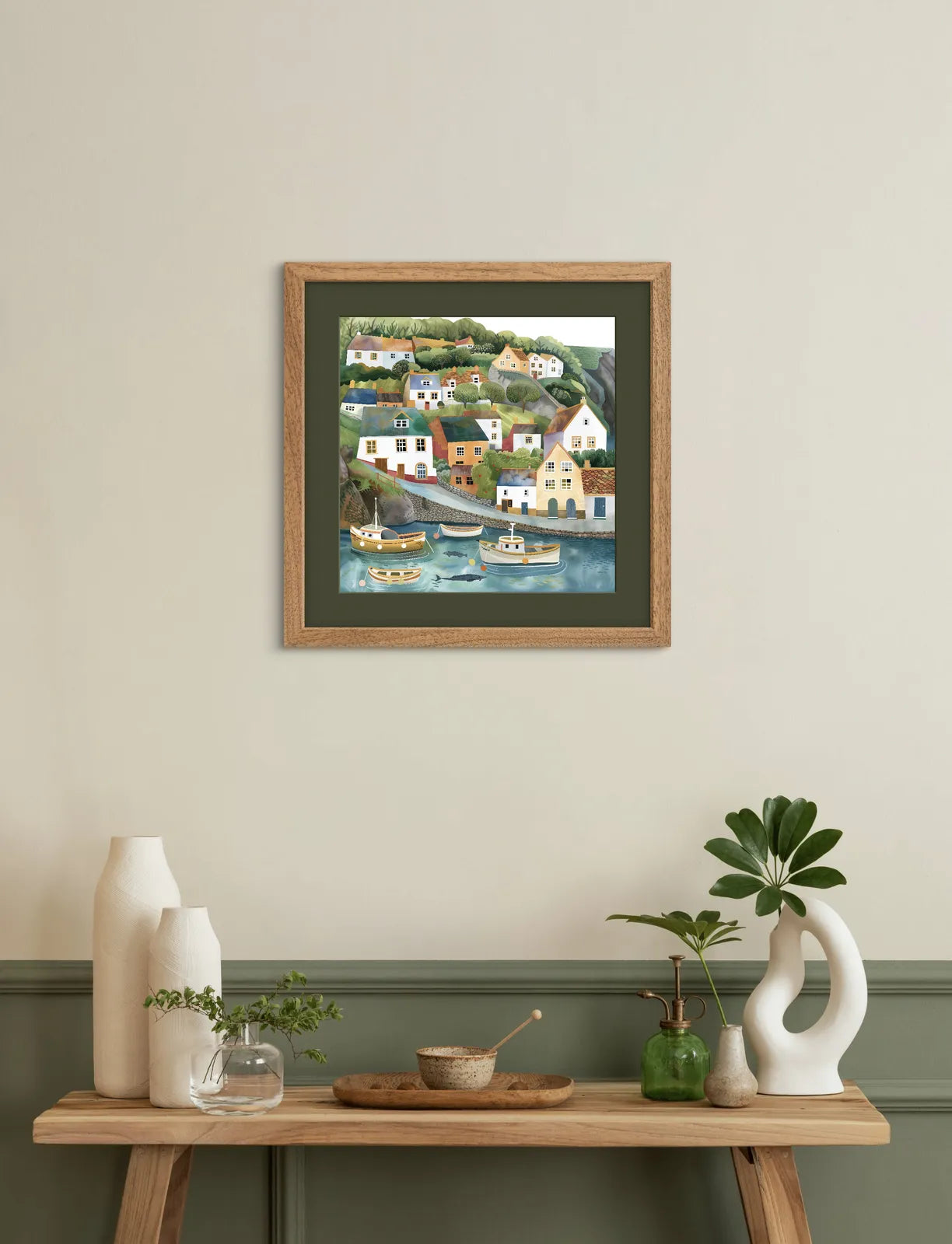 Art print depicting a colourful coastal village with boats in the harbour.